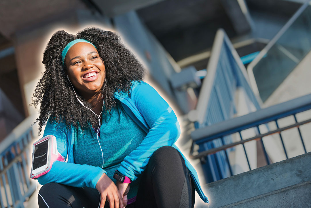 woman jogger resting and smiling