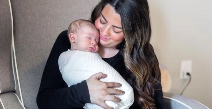 Lesley Jaskierny holds her her new baby
